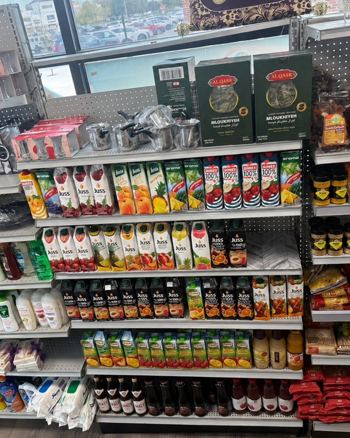Rows of imported juices, tea and packaged foods in the market
