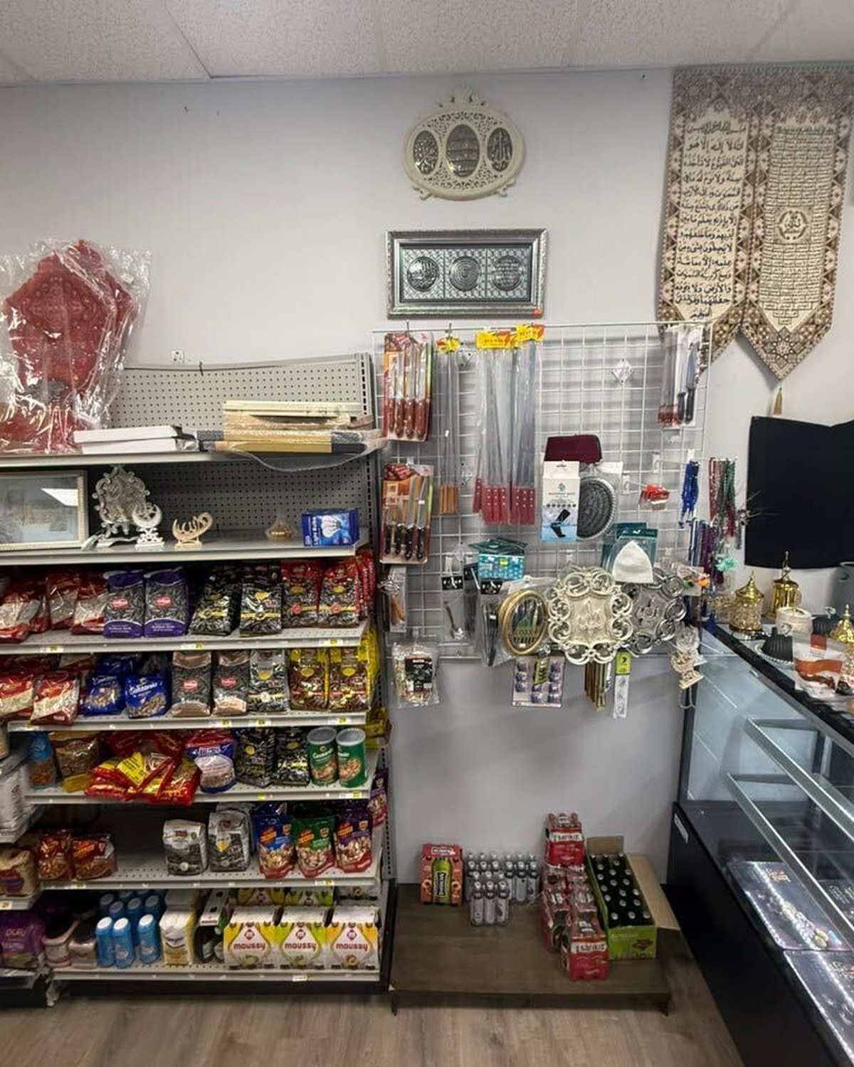 Jars of olives and imported foods on market shelves